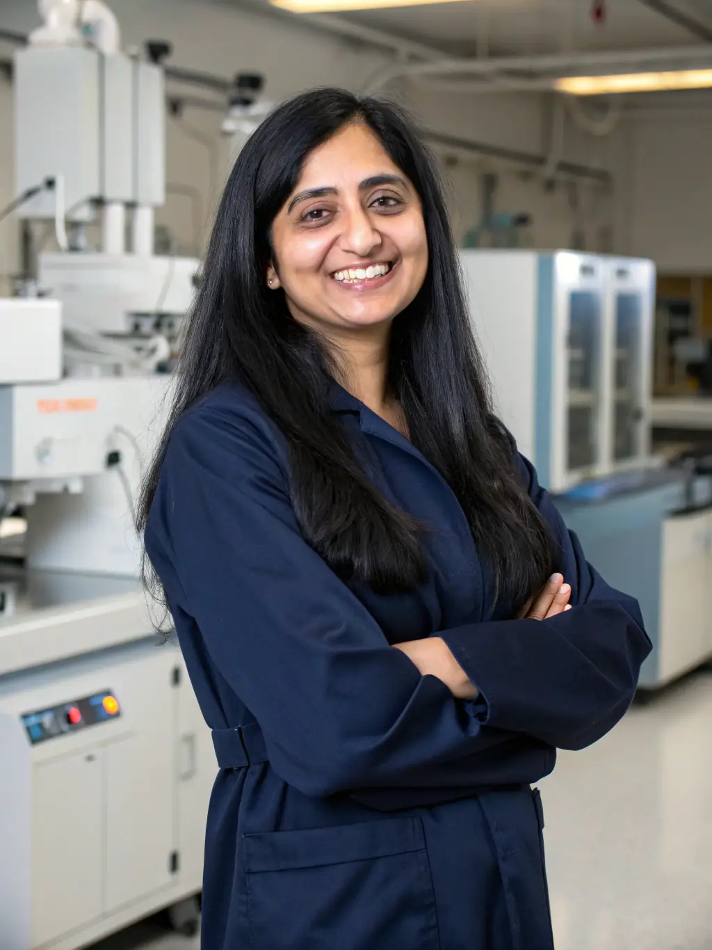 A professional headshot of a keynote speaker, Dr. Anya Sharma, a leading expert in AI and machine learning, presenting at a UK startup conference, with a focus on her engaging presentation style and confident demeanor.
